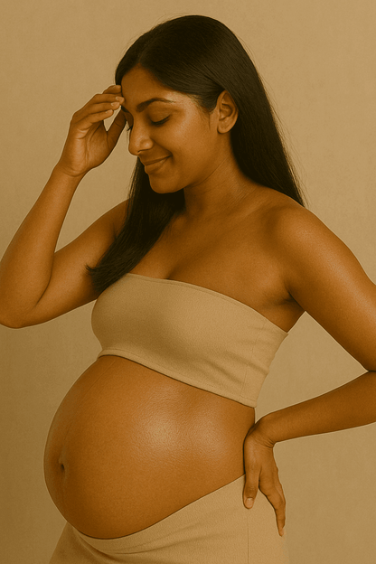 Pregnant woman applying Gentle Roots Baby Friendly Face and Body Balm – soothing natural belly care.