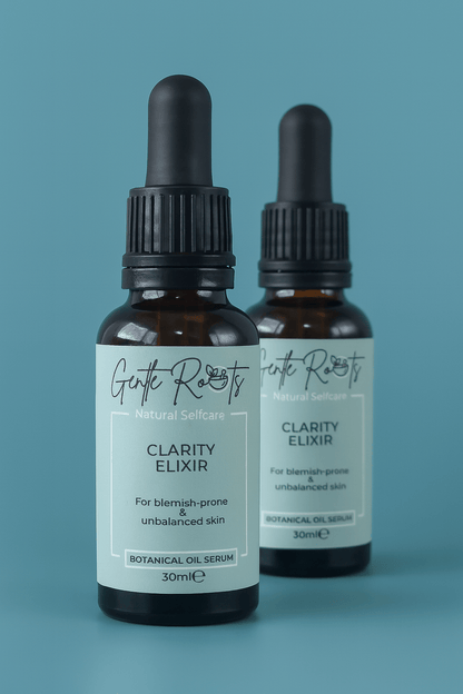 Gentle Roots Clarity Elixir collection displayed on teal background – vegan skincare for acne-prone skin.