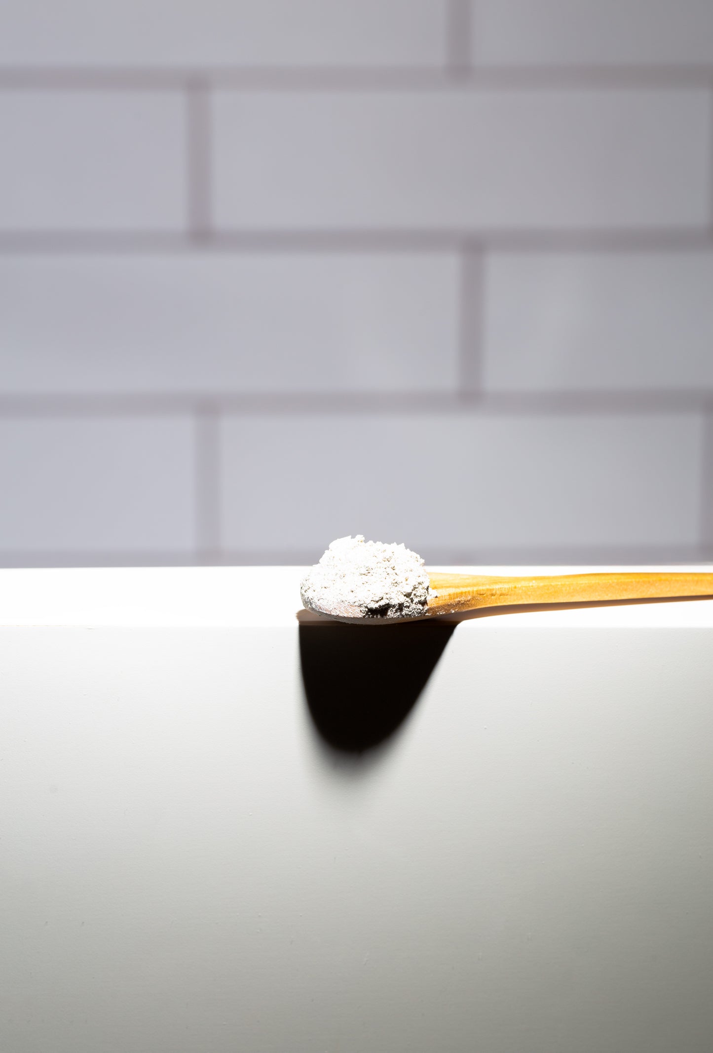 Bamboo spoon with powdered Detox Clay Face Mask – eco-friendly skincare
