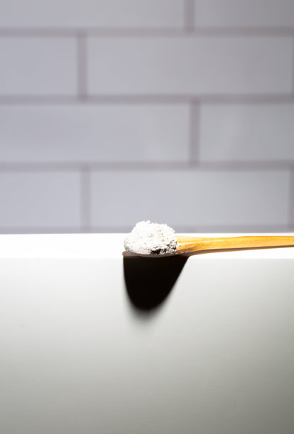Bamboo spoon with powdered Detox Clay Face Mask – eco-friendly skincare