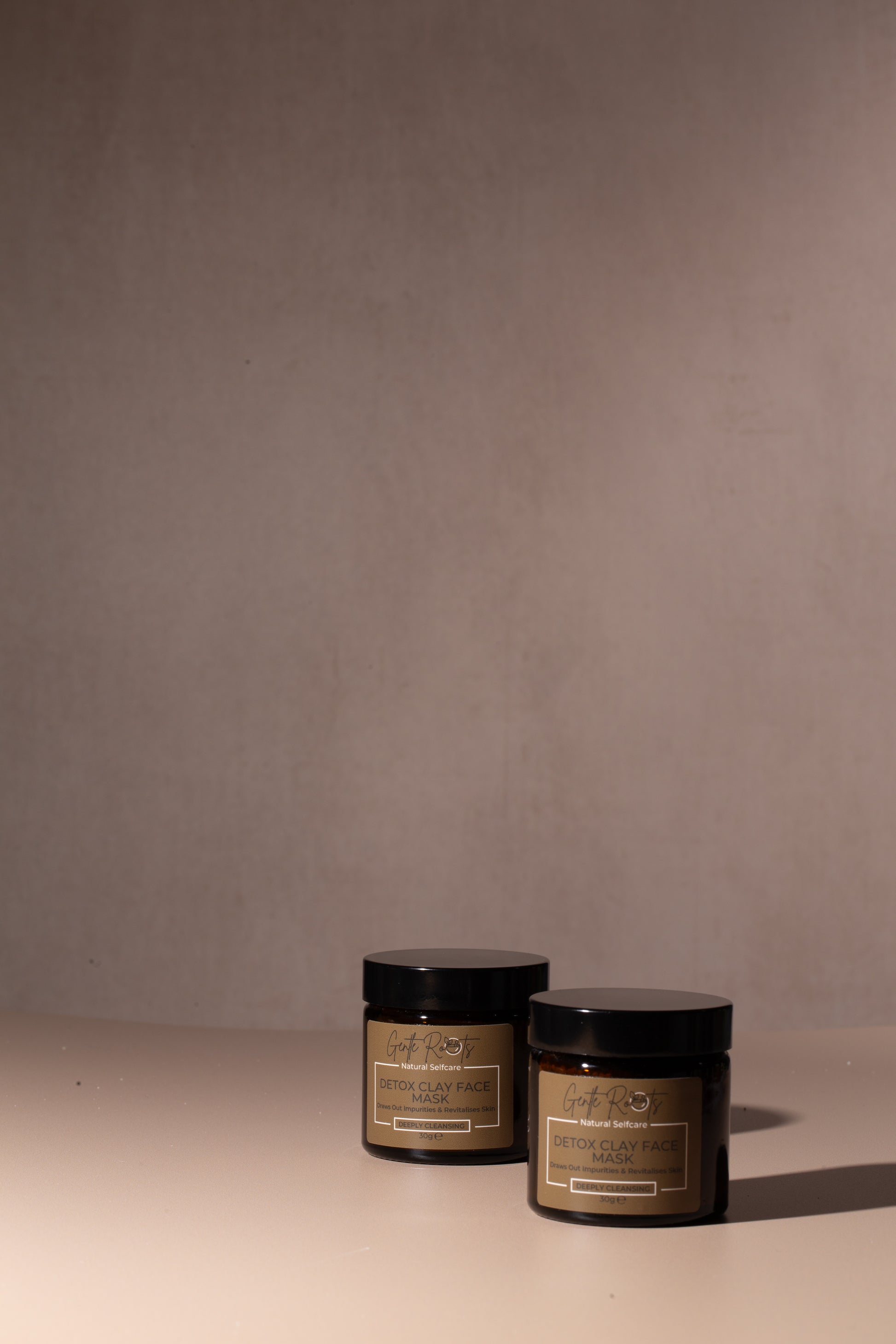 Natural Detox Clay Face Mask jars on neutral background – Gentle Roots