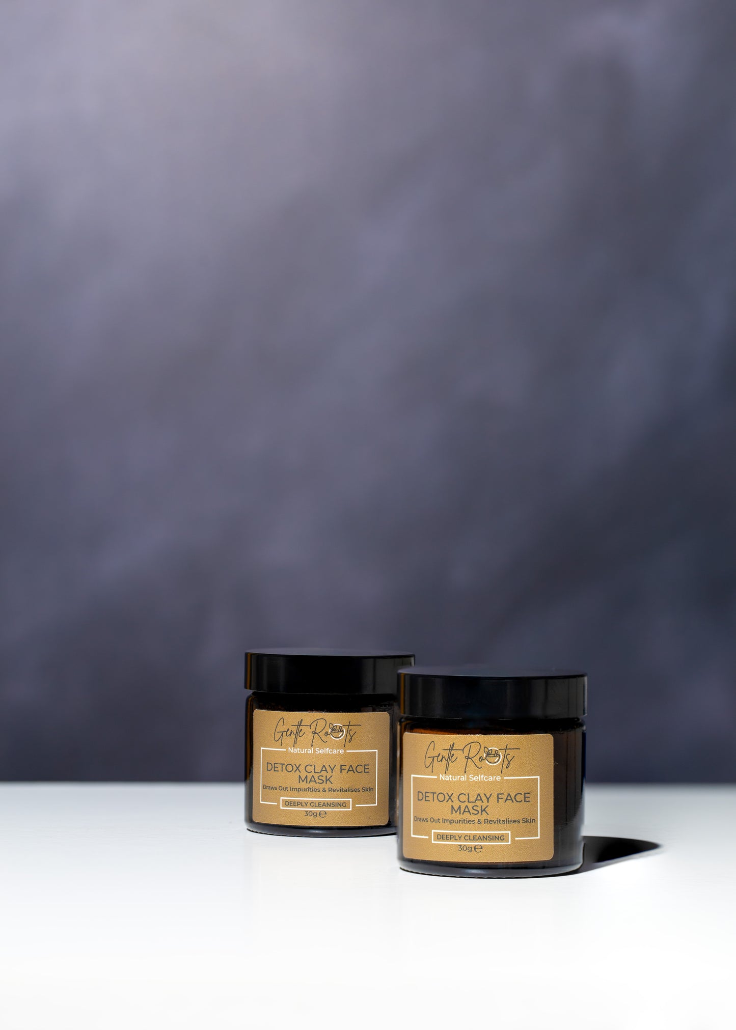 Product shots of the Gentle Roots Detox Clay Face Mask in amber glass jar – handmade natural skincare UK