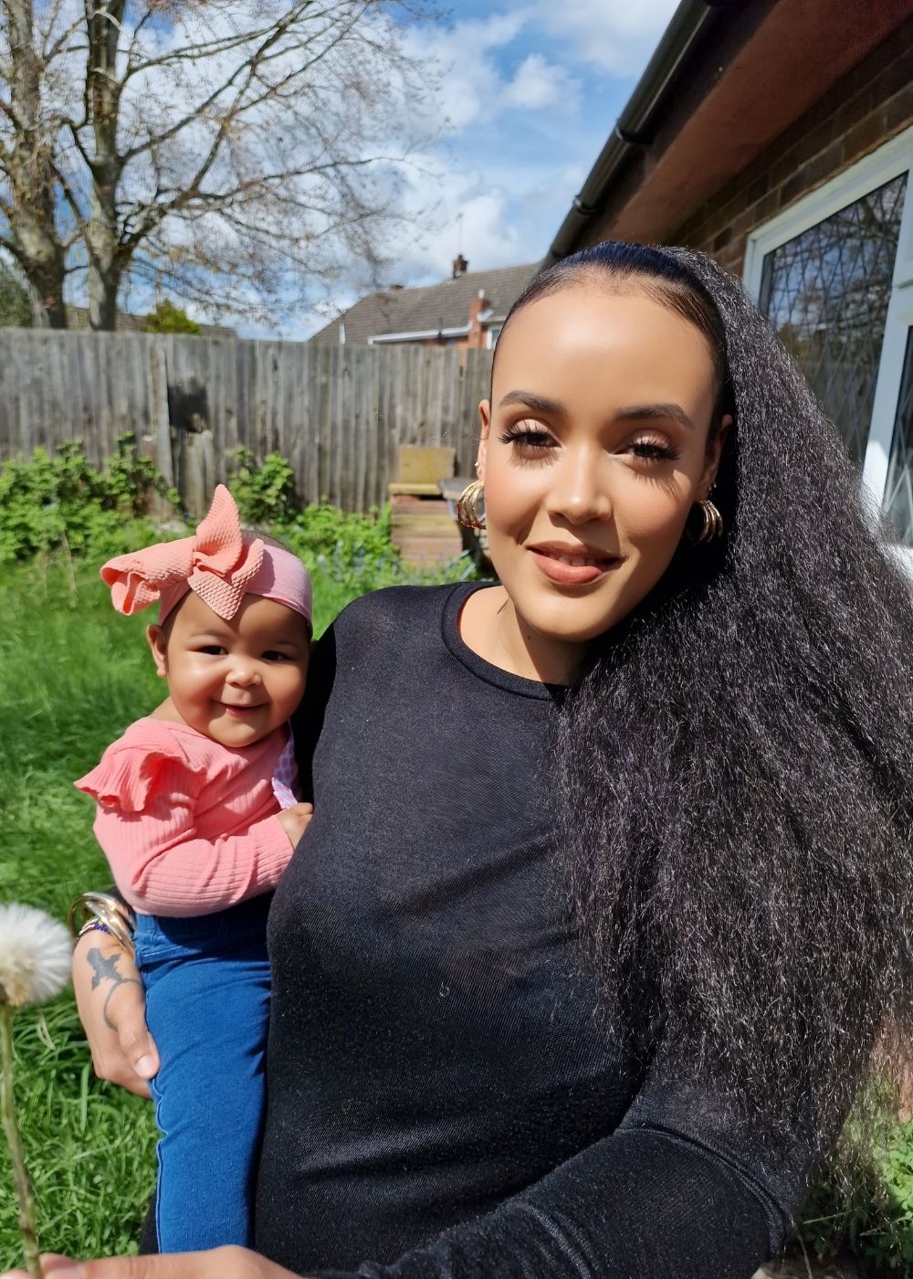 Jessica, founder of Gentle Roots, holding her baby – the inspiration behind the handmade, non-toxic family skincare brand.