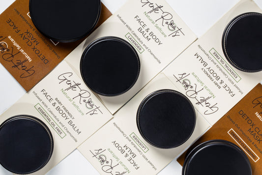 Gentle Roots Mini Skincare Collection – travel size balms, detox clay mask and body oil in eco-friendly packaging.