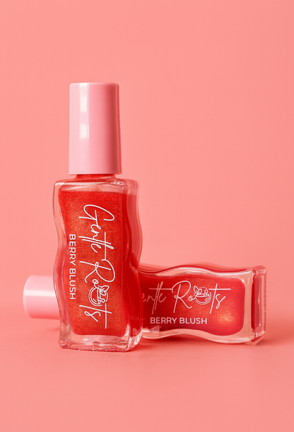 Gentle Roots Nourish Lip Oil Berry Blush, strawberry flavoured and tinted variant on bright pink background.