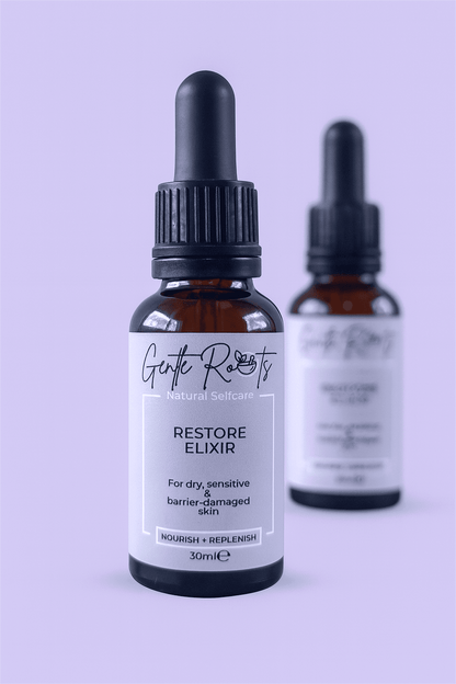 Pair of Gentle Roots Restore Elixir bottles – gentle, non-toxic skincare oil to strengthen and calm the skin barrier.