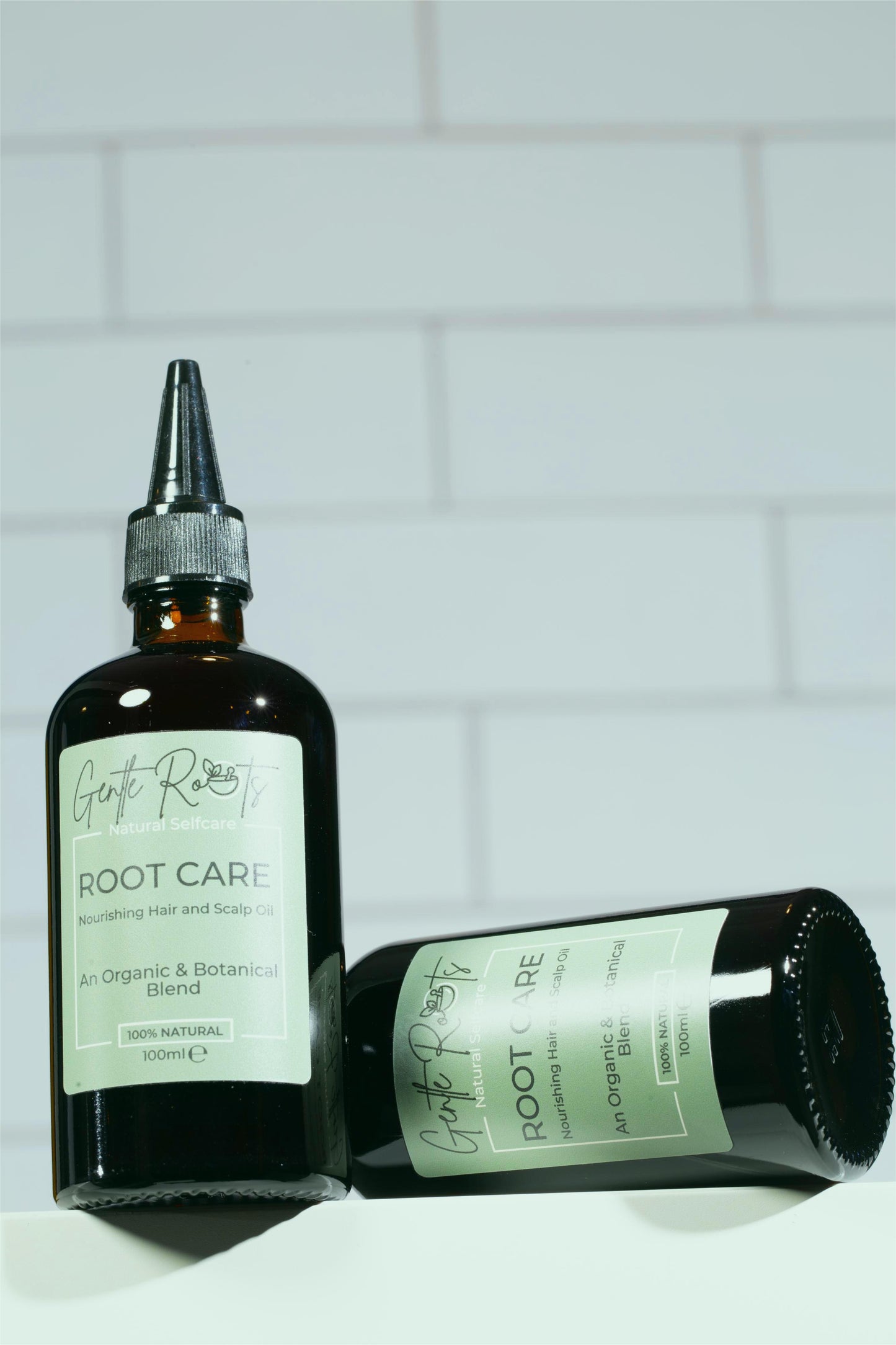 Root Care Hair & Scalp Oil lifestyle shot in bathroom – Gentle Roots