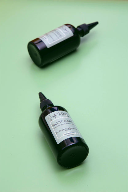 Root Care Hair & Scalp Oil flatlay on a green background – Gentle Roots