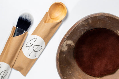 Gentle Roots eco-friendly essentials masking kit with coconut bowl, wooden spoon and wooden face mask brush for seamless mask application and mixing.